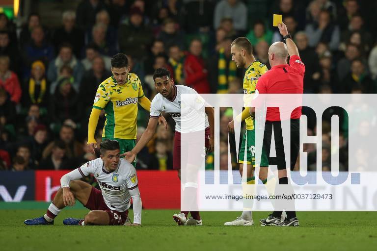 Norwich City v Aston Villa Sky Bet Championship Tom Trybull of Norwich gets a yellow card from Referee Simon Hooper for a foul on Jack Grealish of Aston Villa during the Sky Bet Championship match at Carrow Road, Norwich Content Not Available For UK Newspapers