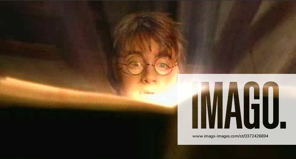 Harry Potter and the Chamber of Secrets New scenes from the forthcoming Harry Potter and the Chamber of Secrets movie from Warner Bros. Here Harry opens a magic book. Photograph, Credit: Warner Bros Avalon USA, New York