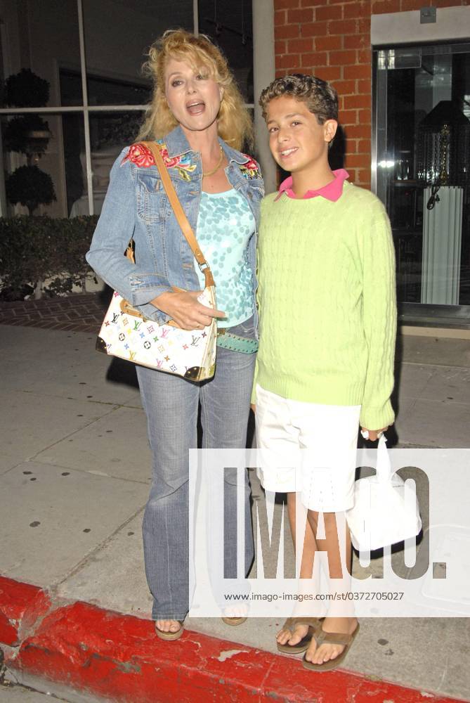 Audrey Landers and her son outside of Mr. Chow restaurant. 10247, BEVERLY HILLS, CALIFORNIA, Thursday June 8 2006. Audrey Landers waited with her son for her sister Judy Landers . After eating at Mr. Chow restaurant, Judy and her daughters Lindsay and Christy posed for photos. Photograph: Adrian Varnedoe Pacificcoastnews.com. UK OFFICE: +44 131 225 3333 3322 US OFFICE: 1 310 261 9676, Credit:Adrian Varnedoe Avalon USA