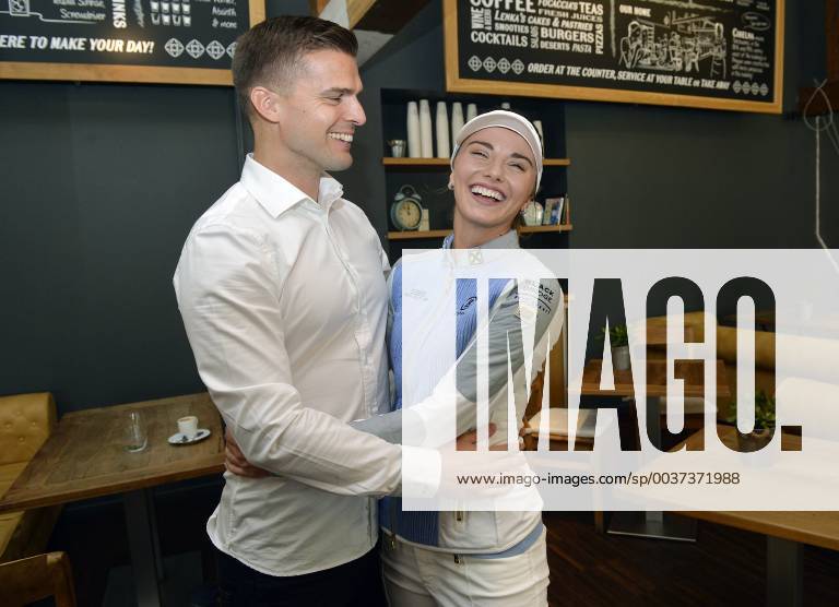 Czech professional golfer Klara Spilkova (right) and her boyfriend and physiotherapist Martin Prochazka pose for photographer during a meeting with journalists in Prague, Czech Republic on November 6, 2018. (CTKxPhoto MichaelaxRihova) CTKPhotoP201811060557601 mir 6