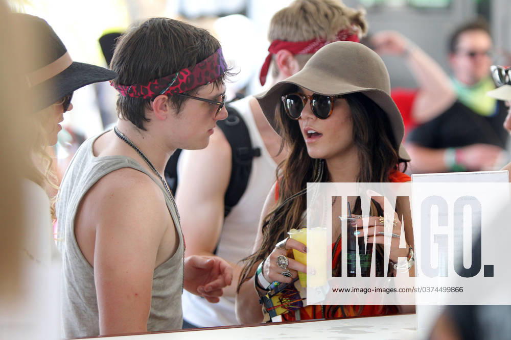 Vanessa Hudgens and Josh Hutcherson planning their day at the Coachella festival 2011 53696, INDIO, CALIFORNIA - Friday April 15 2011. Vanessa Hudgens and Josh Hutcherson planning their day at the Coachella festival 2011. Photograph;, Credit:Dome, Jones Avalon USA, Indio