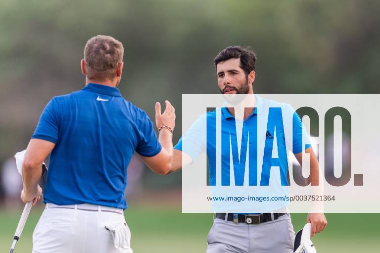 Adrian Otaegui of Spain (right) shakes hands with Jortdan Smith of England at the end of round 2 during the DP World Tour Championship at Jumeirah Golf Estates, Dubai, UAE on 16 November 2018.