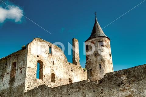 Ruins of Haapsalu Episcopal Castle, Estonia. outdoors architecture haapsalu estonia christianity summer tallinn building exterior blue history built structure famous place cultures old roof religion travel day ancient travel destinations medieval old ruin nature tourism stone material brick spirituality rural scene cross monument window byzantine catholicism ruined tourist wall construction industry building feature landscape chapel arch antiquities the crusades obsolete minaret surrounding wall symbol gothic style god
