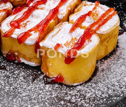 Delicious fruit sushi rolls in pancake with cottage cheese black background cottage cheese sushi rolls fruit sushi background chocolate fruit black sushi cheese cottage pancake rolls food rice healthy dinner asian lunch cream fresh traditional passion fruit passion