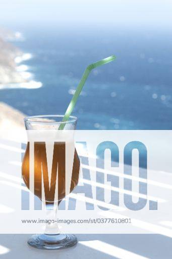 A vertical shot of a glass of fresh refreshing orange juice in the Greek island of Folegandros 149290 RECORD DATE NOT STATED