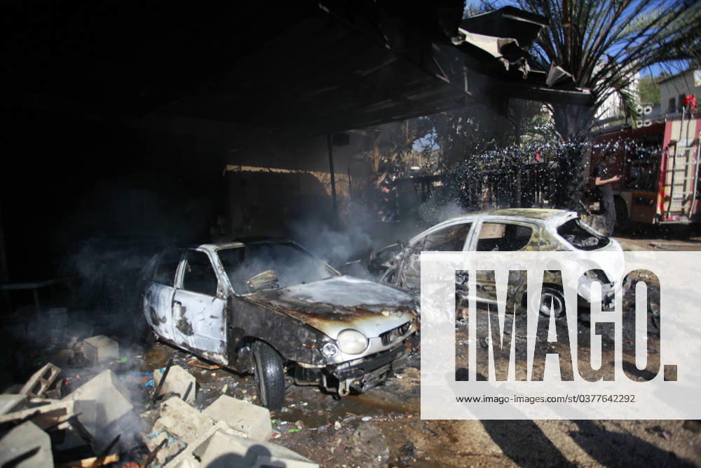 Firefighters douse a car after an Israeli raid in al-Faraa camp for Palestinian refugees near Tubas Firefighters douse a car after an Israeli raid in al-Faraa camp for Palestinian refugees near Tubas in the occupied West Bank on December 18, 2023. Four Palestinians, including two teenagers, were killed on December 18, 2023 in an Israeli raid on a refugee camp in the northern occupied West Bank, the Palestinian Health Ministry reported. Photo by Mohammed Nasser apaimages Tubas West Bank Palestinian Territory 181223_Tubas_MN_00(14)