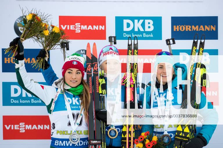 BIATHLON - IBU World Cup POKLJUKA,SLOVENIA,08.DEC.18 - BIATHLON - IBU World Cup, 7.5km sprint competition, ladies, award ceremony. Image shows Dorothea Wierer (ITA), Kaisa Makarainen (FIN) and Justine Braisaz (FRA). GEPAxpictures Klansek