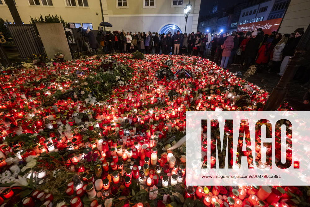 A place of worship with candles created in front of the Karolinum for the victims of the shooting from the previous day at the Faculty of Arts, Charles University, in Prague, Czech Republic, on December 22, 2023. Twenty-four-year-old student shot dead 14 people and wounded 25 others at the school. (CTKxPhoto MichaelaxRihova) CTKPhotoP2023122208472 CTKPhotoP2023122208472