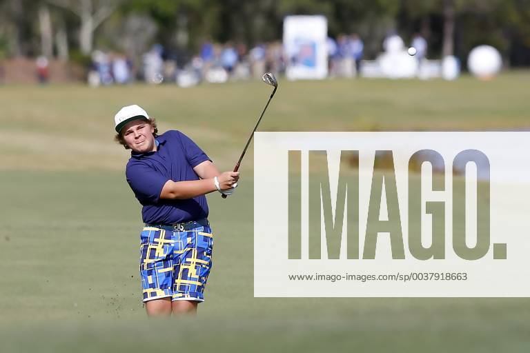 ORLANDO, FL - DECEMBER 13: Little John Daly, son of John Daly, chips onto the 18th green during the Pro-Am of the 2018 PNC Father Son Challenge on December 13, 2018 at the The Ritz-Carlton Golf Club in Orlando, Florida. (Photo by Cliff Welch Icon Sportswire) GOLF: DEC 13 Champions Tour - PNC Father Son Challenge Icon121318116