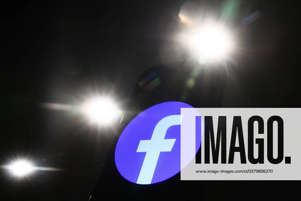 Popular Apps And IT Companies Photo Illustrations Lights and Facebook logo displayed on a phone screen are seen in this illustration photo taken in Krakow, Poland on December 27, 2023. Krakow Poland