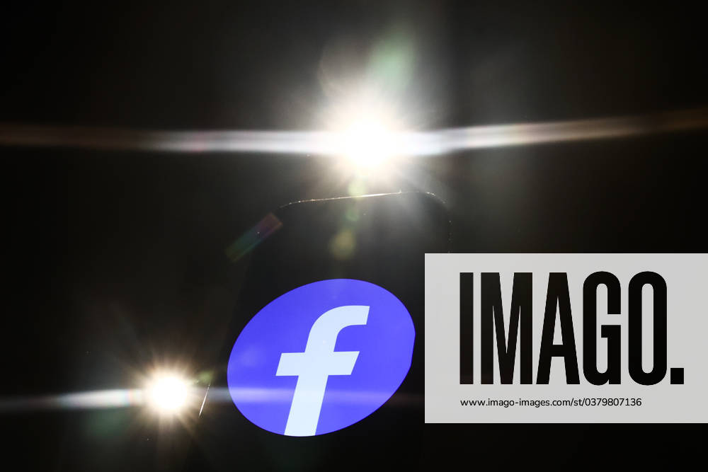 Popular Apps And IT Companies Photo Illustrations Lights and Facebook logo displayed on a phone screen are seen in this illustration photo taken in Krakow, Poland on December 27, 2023. Krakow Poland
