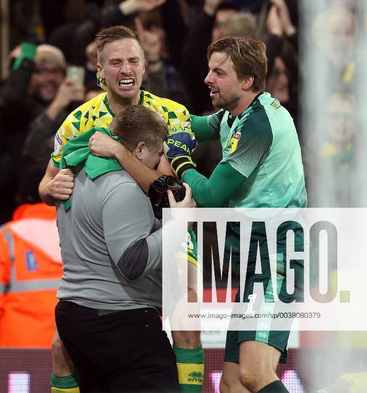 Norwich City v Nottingham Forest Sky Bet Championship Marco Stiepermann of Norwich and Tim Krul of Norwich celebrate their side?s 3rd goal with Club Photographer Jason Dawson during the Sky Bet Championship match at Carrow Road, Norwich Content Not Available For UK Newspapers