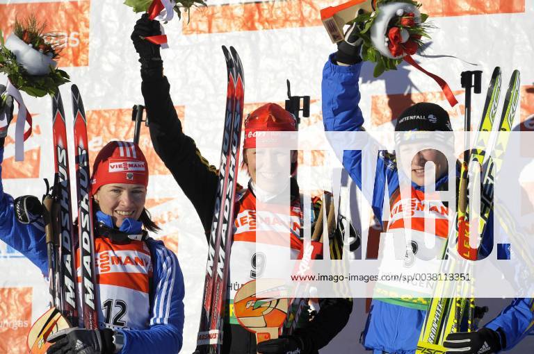 Russia s Olga Medvedtseva left Germany s Kati Wilhelm center and Sweden s Helena Jonsson right celebrate during winner presentation of the women 12 5 km mass start Biathlon World Cup competition in Oberhof Germany Sunday Jan 11 2009 Wilhelm won ahed of Medvedtseva on scond and Jonsson on third Eckehard Schulz Oberhof DEU