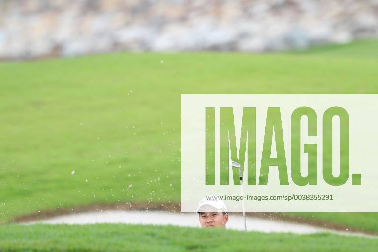 Singapore - Poom Saksansin of Thailand plays a shot on the 5th hole during the second round of the Singapore Open at the Serapong Course, Sentosa Golf Club. Golf 2019: Singapore Open - Second Round - ZUMAm170 88556343st