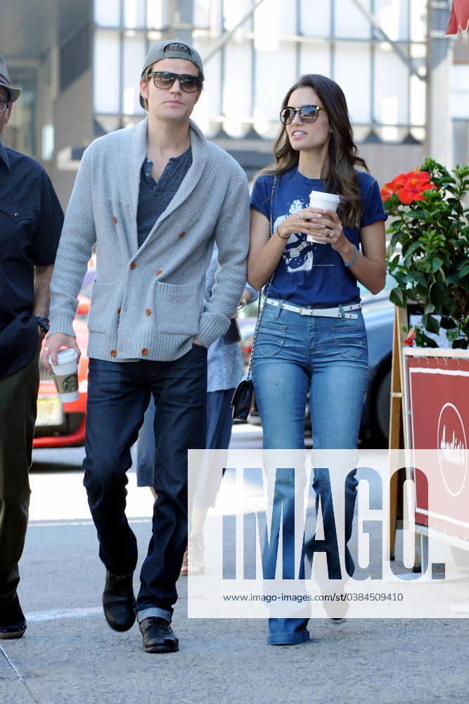 Paul Wesley and wife Torrey DeVitto go out for a stroll and grab some coffee in New York City 78909, NEW YORK, NEW YORK - Friday June 1, 2012. Paul Wesley and wife Torrey DeVitto go out for a stroll and grab some coffee in New York City. The Vampire Diaries couple looked upbeat as they sipped a Starbucks and walked with a friend. , Credit:Hall Pena Avalon USA, New York
