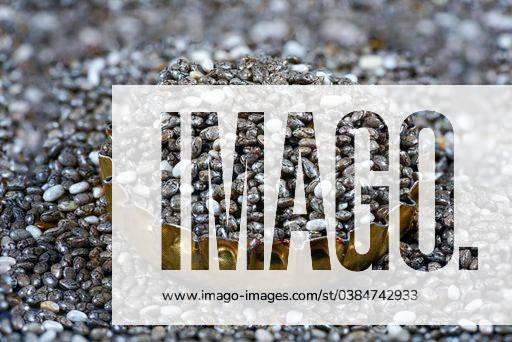 A macro shot of chia seeds in detail against a black background 1602249