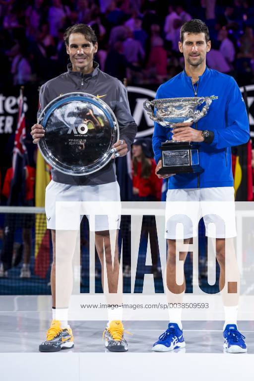 MELBOURNE, AUSTRALIA - JANUARY 27 : Rafael Nadal of ÊSpain and Novak Djokovic of ÊSerbia hold their trophy after at the completion of the final on day 14 of the Australian Open on January 27 2019, at Melbourne Park in Melbourne, Australia.(Photo by Jason Heidrich Icon Sportswire) TENNIS: JAN 27 Australian Open Icon19012705314