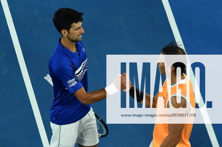 (190127) -- MELBOURNE, Jan. 27, 2019 (Xinhua) -- Novak Djokovic (L)of Serbia shakes hands with Rafael Nadal of Spain after the men s singles final match between Novak Djokovic of Serbia and Rafael Nadal of Spain at 2019 Australian Open in Melbourne, Australia, Jan. 27, 2019. (Xinhua Bai Xue) (SP)AUSTRALIA-MELBOURNE-TENNIS-AUSTRALIAN OPEN-DAY 14
