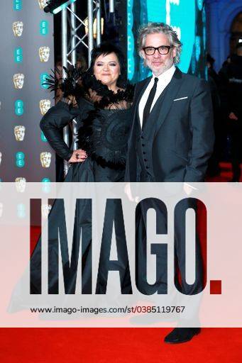 Dalia Ibelhauptaite and Dexter Fletcher attend the EE British Academy Film Awards at the Royal Albert Hall on 02 February, 2020 in London, England. 1675859