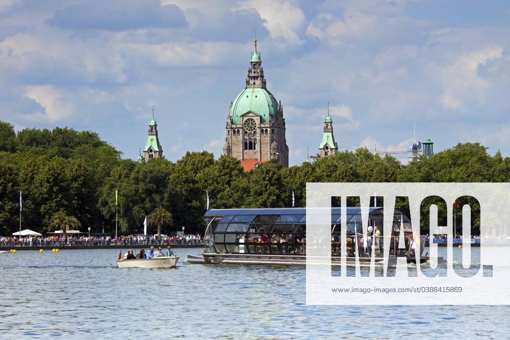 Excursion boat with Tourists on Maschsee and the New City Hall at Background, Hanover, Lower Saxony, Germany, Europe