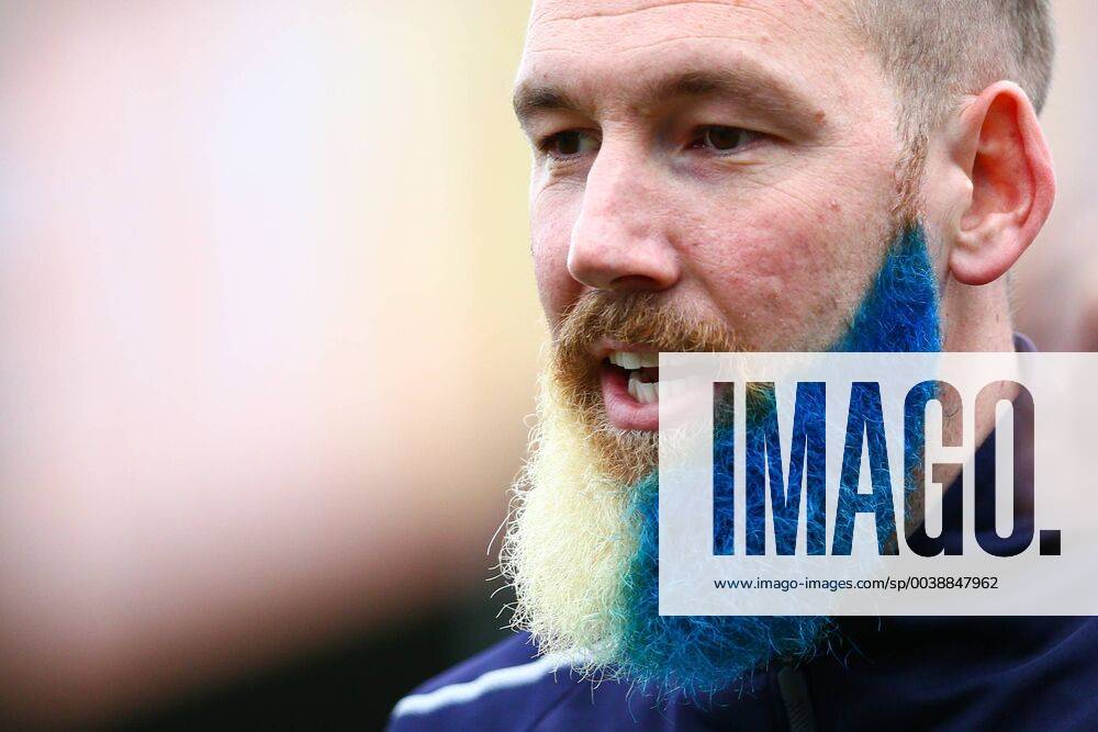 KW07 Scott Wagstaff of AFC Wimbledon shows off his beard dyed in club colours ahead of the FA Cup Fifth Round match at the Cherry Red Records Stadium, London. Picture date: 16th February 2018. Picture credit should read: Craig Mercer Sportimage . C77R1946