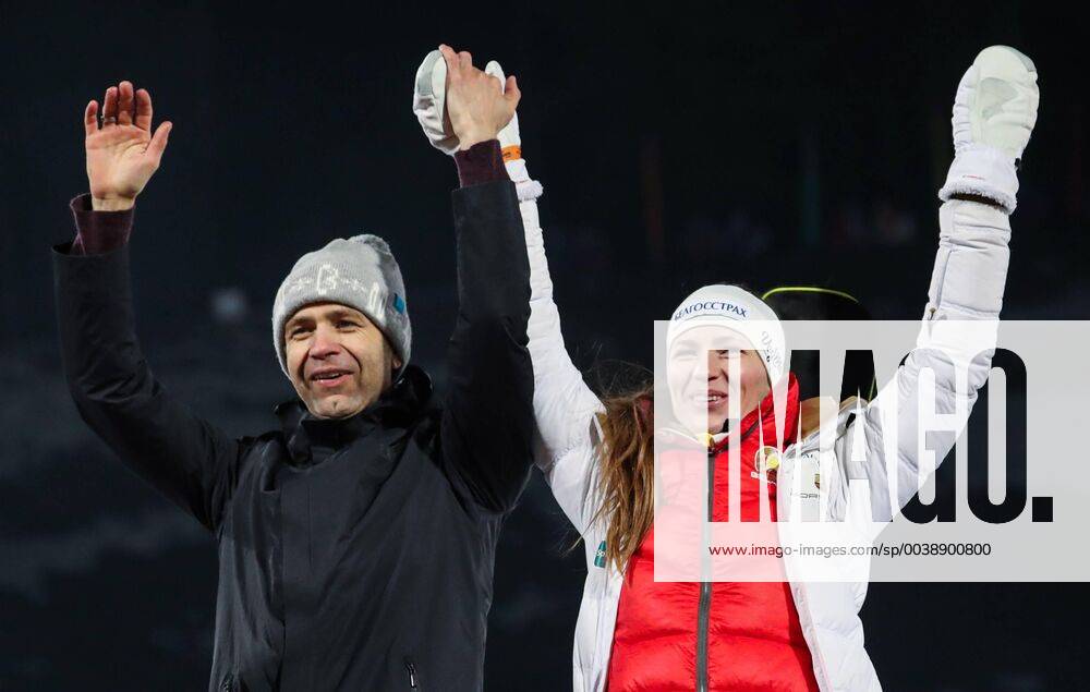 Norway s Ole Einar Bjorndalen Bjoerndalen (L) and Darya Domracheva of Belarus, who finished second in the mixed relay race, celebrate during the victory ceremony at the Legends Race biathlon festival at the Raubichi Olympic Centre in Ostroshitsky Gorodok, Minsk Region. Natalia Fedosenko TASS TS0A17C5
