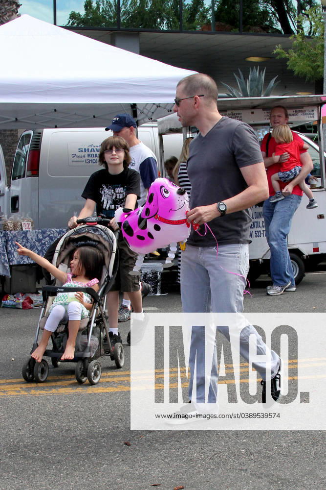Two and a Half Men star Jon Cryer takes his son Charlie Austin and daughter Daisy to the Farmers Market in Studio City 100826, LOS ANGELES, CALIFORNIA - Sunday July 14, 2013. Two and a Half Men star Jon Cryer takes his son Charlie and daughter Daisy to the Farmers Market in Studio City. The actor pushed his young daughter in a stroller with a pink balloon tied to it. , Credit:Bunny, PacificCoastNews.com Avalon USA, Los Angeles
