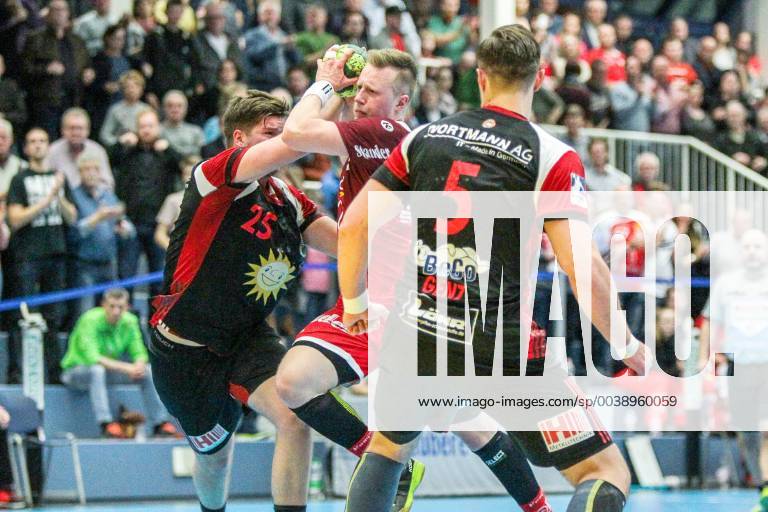 Luca Witzke Essen 7 is blocked by Moritz Schade Luebbecke 25 and Jo Gerrit Genz Luebbecke 5 at the game TUSEM Essen vs TuS N Luebbecke Handball 2 Bundesliga 22 02 2019 TUSEM Essen vs TuS N Luebbecke Handball 2 Bundesliga 22 02 2019 Essen