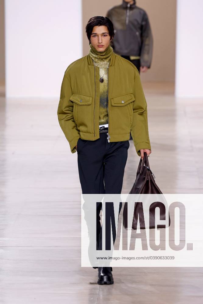 (240121) -- PARIS, Jan. 21, 2024 -- A model presents a creation by Hermes for the Menswear Ready-to-wear Fall Winter 2024-2025 collections during Paris Fashion Week in Paris, France, Jan. 20, 2024. ( Handout via Xinhua) FRANCE-PARIS-FASHION WEEK-HERMES MeetEurope