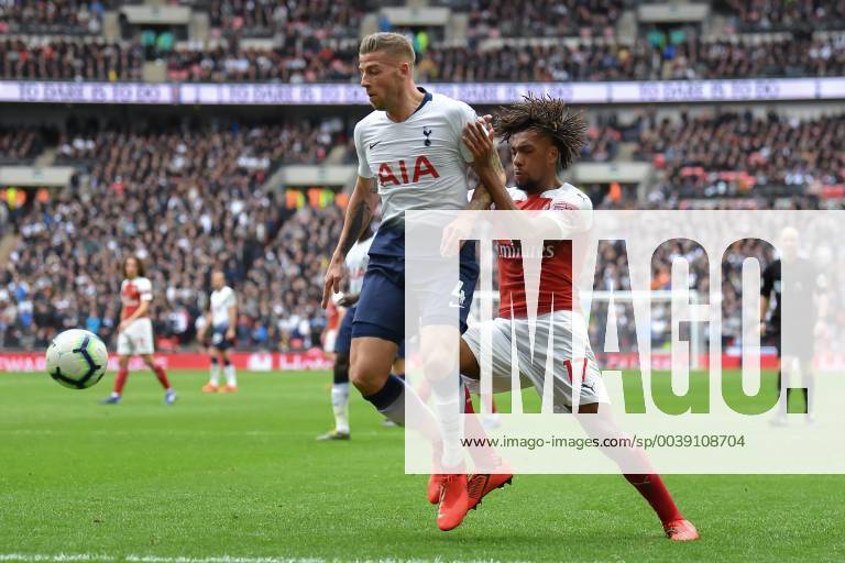 Tottenham Hotspur v Arsenal Premier League Alex Iwobi of Arsenal and Toby Alderweireld of Tottenham Hotspur during the Premier League match at Wembley Stadium, London Content Not Available For UK Newspapers