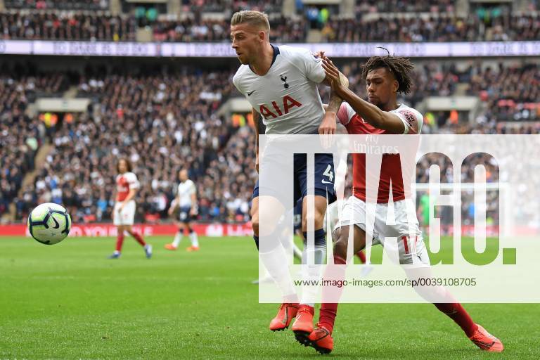 Tottenham Hotspur v Arsenal Premier League Alex Iwobi of Arsenal and Toby Alderweireld of Tottenham Hotspur during the Premier League match at Wembley Stadium, London Content Not Available For UK Newspapers
