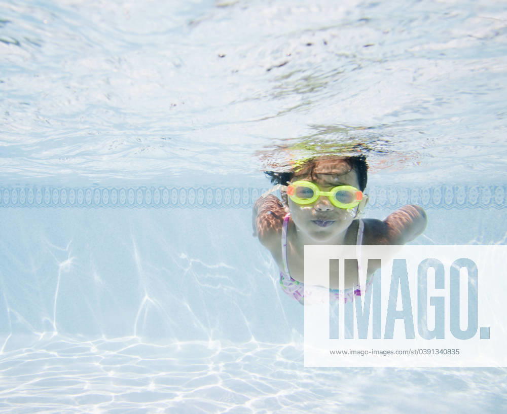 Hispanic girl swimming in pool Huntington Station, NY, 21.12.2023, model released, TTBB_BLD066950.jpg, 4-5 years, active, bathing suit, carefree, childhood, color image, copy space, day, elementary age, enjoying, front view, fun, girl, goggles, holding breath, horizontal, latin american and hispanic ethnicity, latina, leisure, looking at camera, one girl only, one person, outdoors, people, photography, playing, pool, posing, recreation, refreshing, summer, swimmer, swimming, swimming pool, underwater, vacation, weekend activities, minority, minoritiesaccessory, action, amusement, apparel, appreciating, bathing costume, cheerful, child, children, clothes, clothing, color, colour, daylight, daytime, enjoyment, entertainment, female, gal, gar