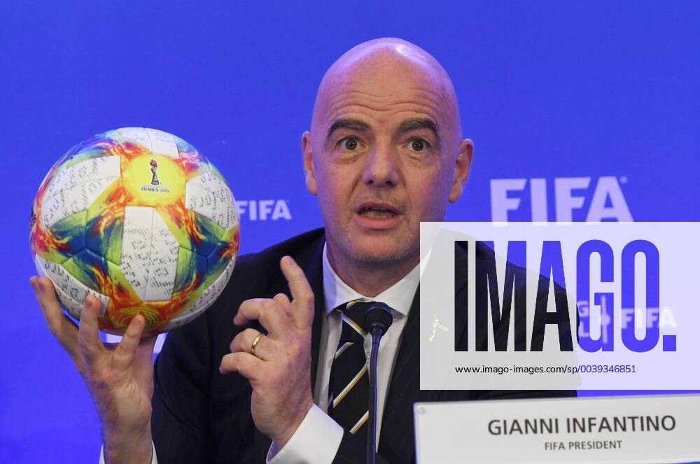 KW11 FIFA President Gianni Infantino holds the ball to be used by the women world cup while he talks to the media at the conclusion of the FIFA Council meeting at the Ritz-Carlton hotel in Coconut Grove in Miami, Florida on March 15, 2019. MIA20190315112 GARYxIxROTHSTEIN