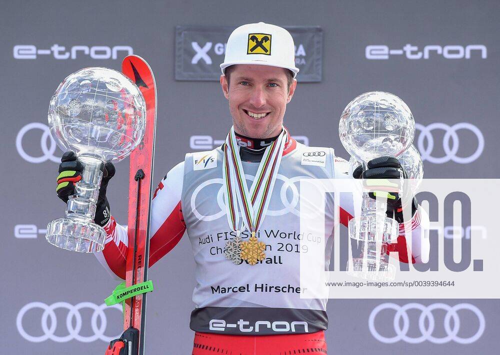 Soldeu AND FIS World Cup Ski Alpine Award Ceremony Overall World Cup ranking Men in picture 1 Place Men Marcel Hirscher with the big crystal ball for the victory in the overall World Cup season 2018 19 and both small crystal balls and World Cup medals from this season all over worlcupwinner Men Marcel Hirscher of Austria with the big crystal globe World Cup season 2018 19 and both small crystal globe and World Cup medals from this season during the men s allover winner Ceremony for the Worlcup of FIS Ski Alpine World Cup finals Soldeu Andorra on 2019 03 17 Soldeu EX_SPI