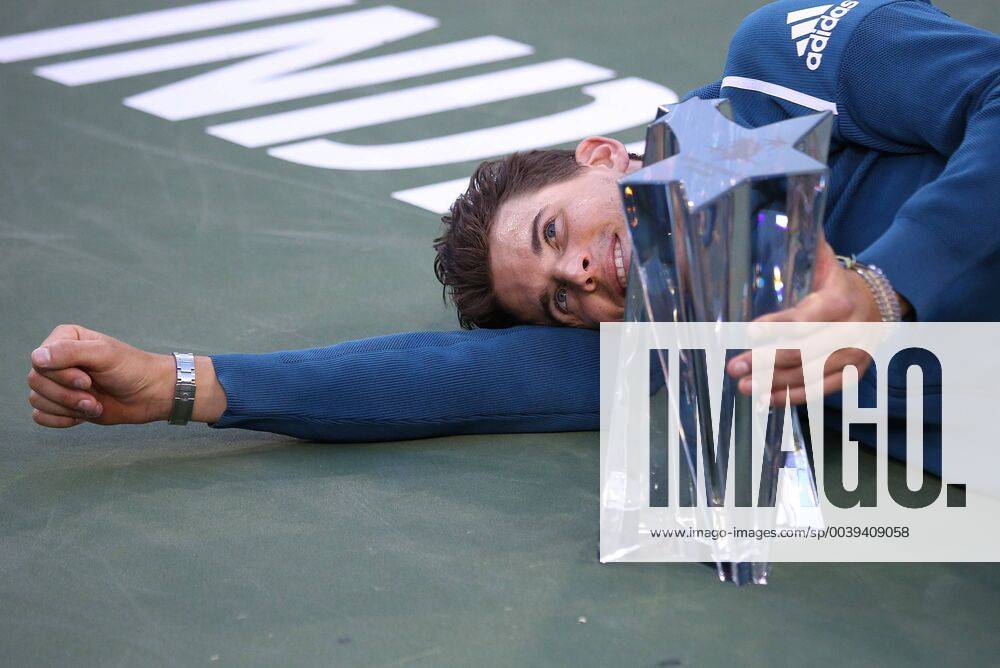 KW11 Dominic Thiem of Austria holds the championship trophy after winning his men s final match against Roger Federer of Switzerland at the BNP Paribas Open in Indian Wells, California on March 17, 2019. Thiem defeated Federer 3-6, 6-3, 7-5 to win the championship and his first ATP Tennis Herren Masters 1000 tournament. IDW201903177048 DAVIDxSILPA
