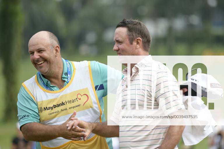 Kuala Lumpur, Malaysia - Scott Hend of Australia celebrates with his caddie after he wins the Maybank Championship 2019 at Saujana Golf and Country Club on March 24, 2019 in Kuala Lumpur, Malaysia. Scott Hend Wins The Maybank Championship 2019 - ZUMAn230 20190324_zaa_n230_118