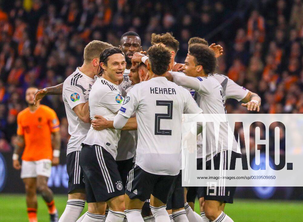 Celebrate the goal Goal celebration 0 2 of Serge Gnabry Germany Germany 24 03 2019 Netherlands vs Germany EM Qualification Amsterdam Arena DISCLAIMER DFB regulations prohibit any use of photographs as image sequences and or quasi video