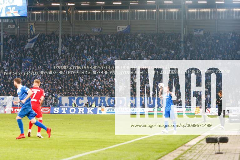 Fussball 2 Bundesliga 1 FC Magdeburg 1 FC Heidenheim v l Magdeburger Fans show solidarity with Hannover 96 President Martin Kind 50 1 Magdeburg