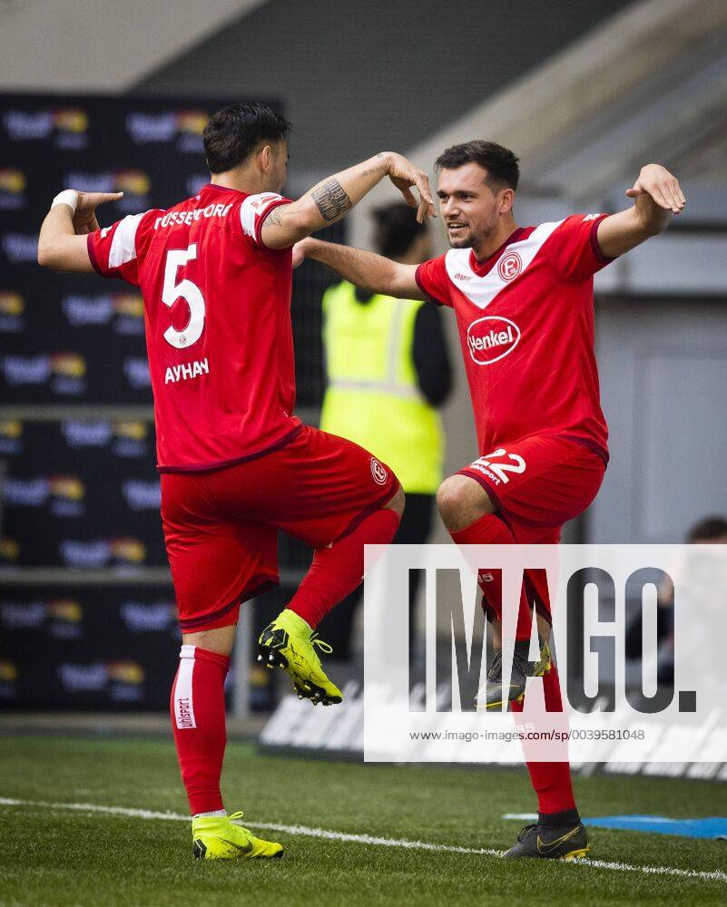 Düsseldorf 30 03 2019 Goal celebration Kaan Ayhan F95 and Kevin Stöger F95 make the crane Fortuna Düsseldorf Borussia Mönchengladbach DFL regulations prohibit any use of photographs as image sequences and or quasi video