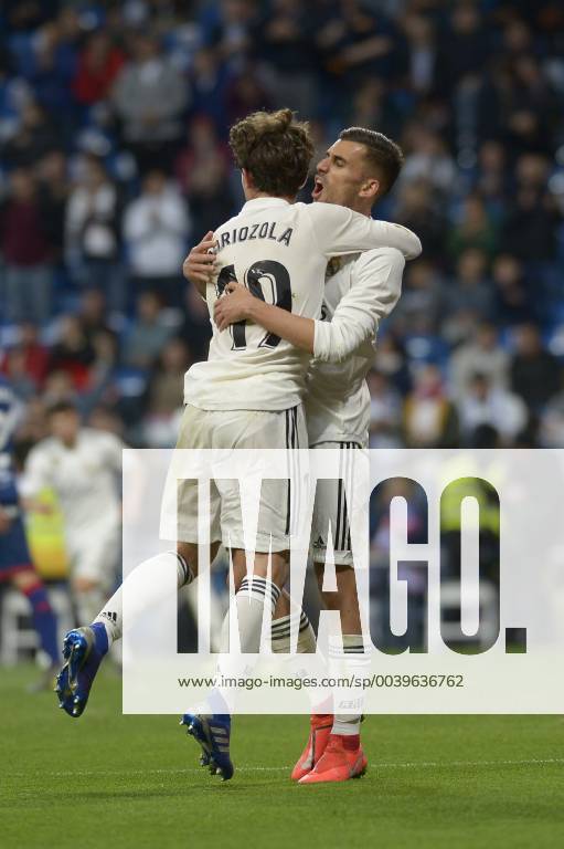 Madrid, Madrid, Spain - Dani Ceballos and Odriozola of Real Madrid celebrate after the second goal during a match between Real Madrid vs SD Huesca for La Copa del Rey at Santiago Bernabeu Stadium on March 31, 2019 in Madrid, Spain. Real Madrid CF v SD Huesca - La Liga - ZUMAn230 20190331_zaa_n230_975