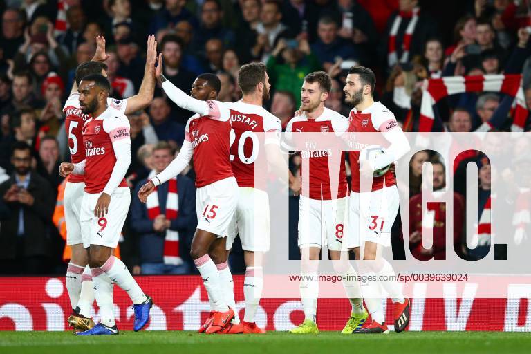 Aaron Ramsey of Arsenal celebrates scoring the opening goal with team-mates during the Premier League match at the Emirates Stadium, London. Picture date: 1st April 2019. Picture credit should read: Craig Mercer Sportimage . SPI-0011-0015