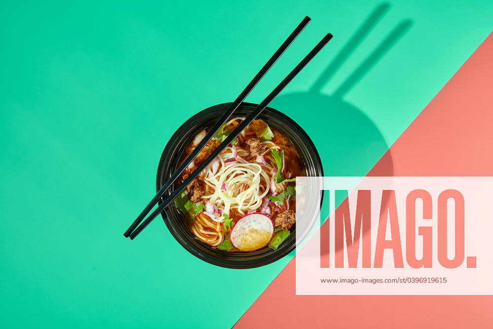 Birria ramen, consomme soup with beef and noodle. Mix of Mexican and Asian cuisine Birria ramen, consomme soup with beef and noodle. Mix of Mexican and Asian cuisine.
