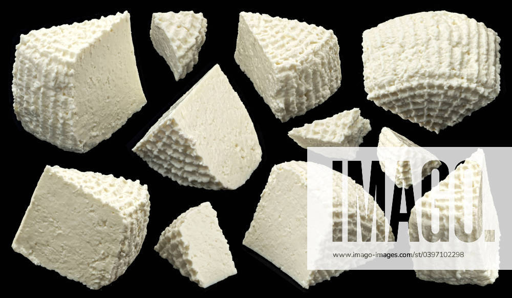 Fresh ricotta slices, homemade organic white cottage cheese on black background Fresh ricotta slices, homemade organic white cottage cheese isolated on black background, full depth of field