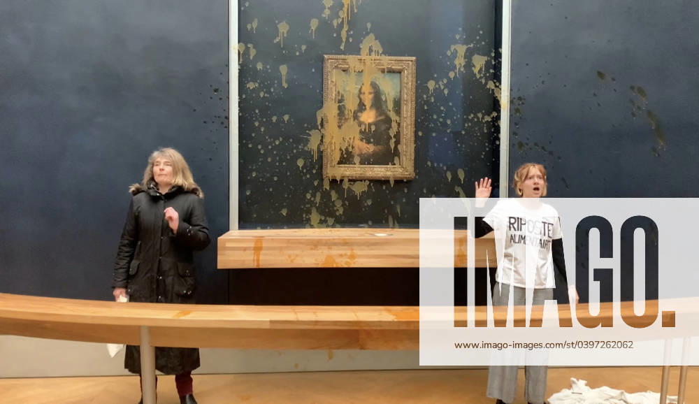 Protesters throwing soup at Mona Lisa painting - Paris A screen grab captured from a video shows two environmental activists from the collective dubbed Riposte Alimentaire (Food Retaliation) after throwing soup at Leonardo da Vinci s famous renaissance Mona Lisa (La Joconde) painting at Louvre Museum in Paris, France on January 28, 2024. Photo by CLP ABACAPRESS.COM Paris France