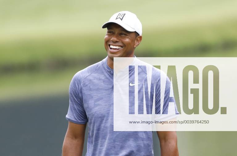 Tiger Woods smiles on the 16th green at practice on the Monday before the 2019 Masters Tournament at Augusta National Golf Club in Augusta, Georgia, on April 8, 2019. AUG20190408125 JOHNxANGELILLO