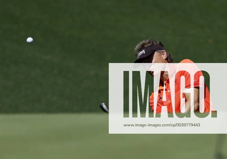 Bernhard Langer of Germany hits a pitch shot to the 10th green at practice on the Tuesday before the 2019 Masters Tournament at Augusta National Golf Club in Augusta, Georgia, on April 9, 2019. AUG20190409123 JOHNxANGELILLO