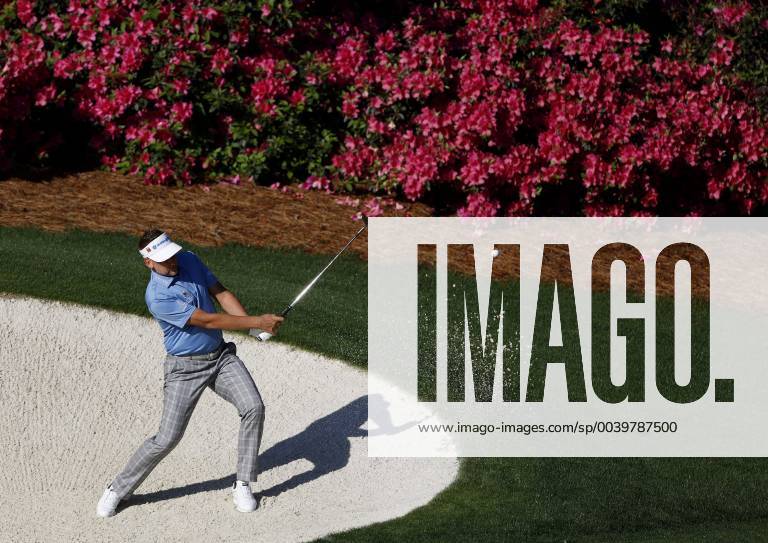 Ian Poulter of the United Kingdom hits out of a bunker to the 13th green at practice on the Wednesday before the 2019 Masters Tournament at Augusta National Golf Club in Augusta, Georgia, on April 10, 2019. AUG20190410105 JOHNxANGELILLO