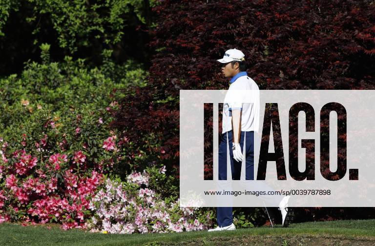 Hideki Matsuyama of Japan walks to the 13th green at practice on the Wednesday before the 2019 Masters Tournament at Augusta National Golf Club in Augusta, Georgia, on April 10, 2019. AUG20190410110 JOHNxANGELILLO