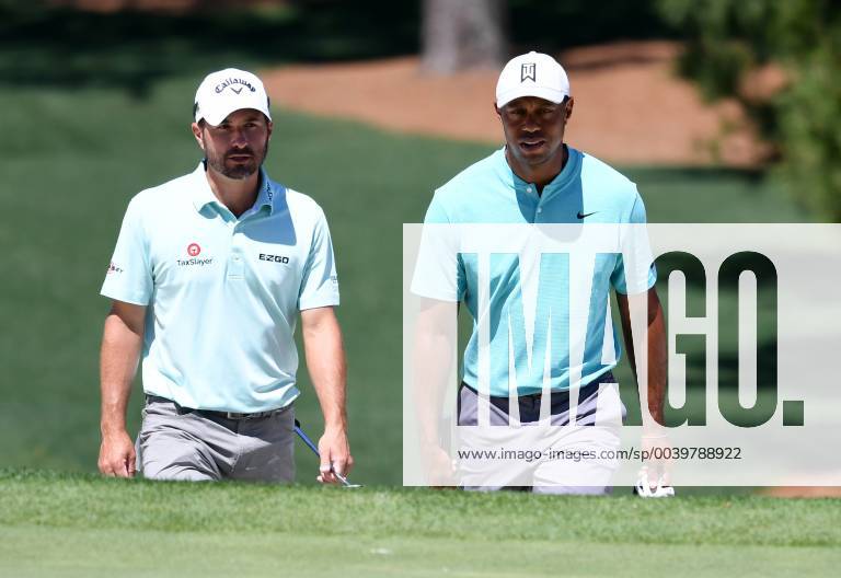 Tiger Woods and Kevin Kisner walk to the 7th green at practice on the Wednesday before the 2019 Masters Tournament at Augusta National Golf Club in Augusta, Georgia, on April 10, 2019. AUG20190410907 KEVINxDIETSCH