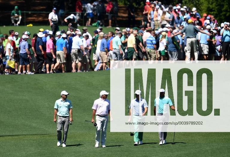 Kevin Kisner Fred Coupes, Zach Johnson and Tiger Woods walk after their tee shots at practice on the Wednesday before the 2019 Masters Tournament at Augusta National Golf Club in Augusta, Georgia, on April 10, 2019. AUG20190410909 KEVINxDIETSCH